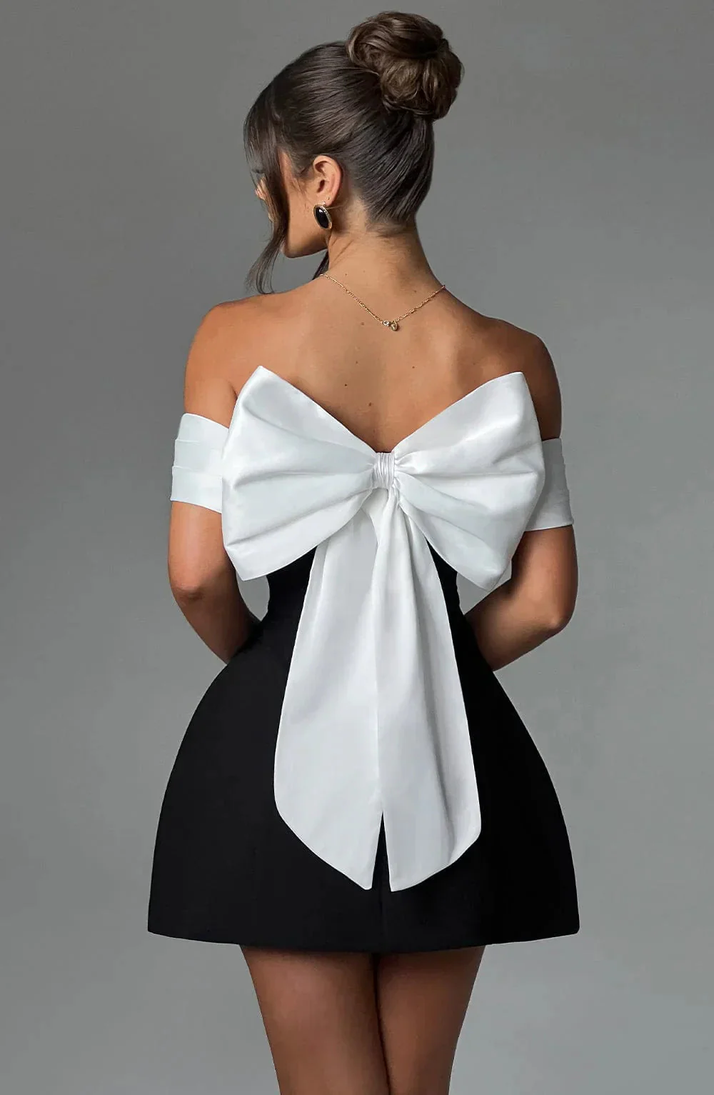 Sophisticated Mini Dress With A Bow Design - Image 3