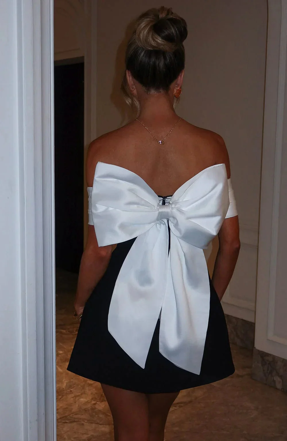 Sophisticated Mini Dress With A Bow Design - Image 4