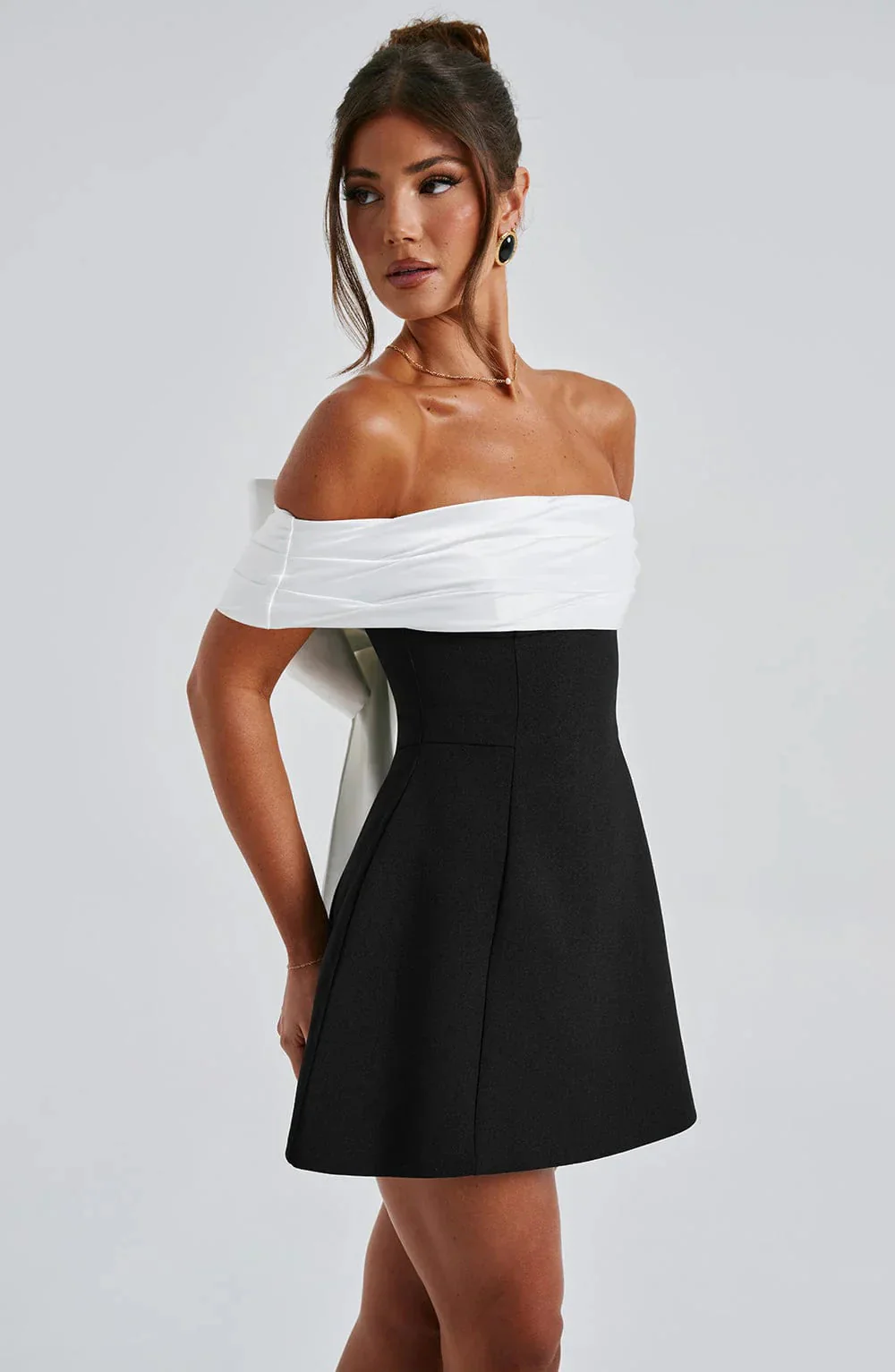 Sophisticated Mini Dress With A Bow Design - Image 7