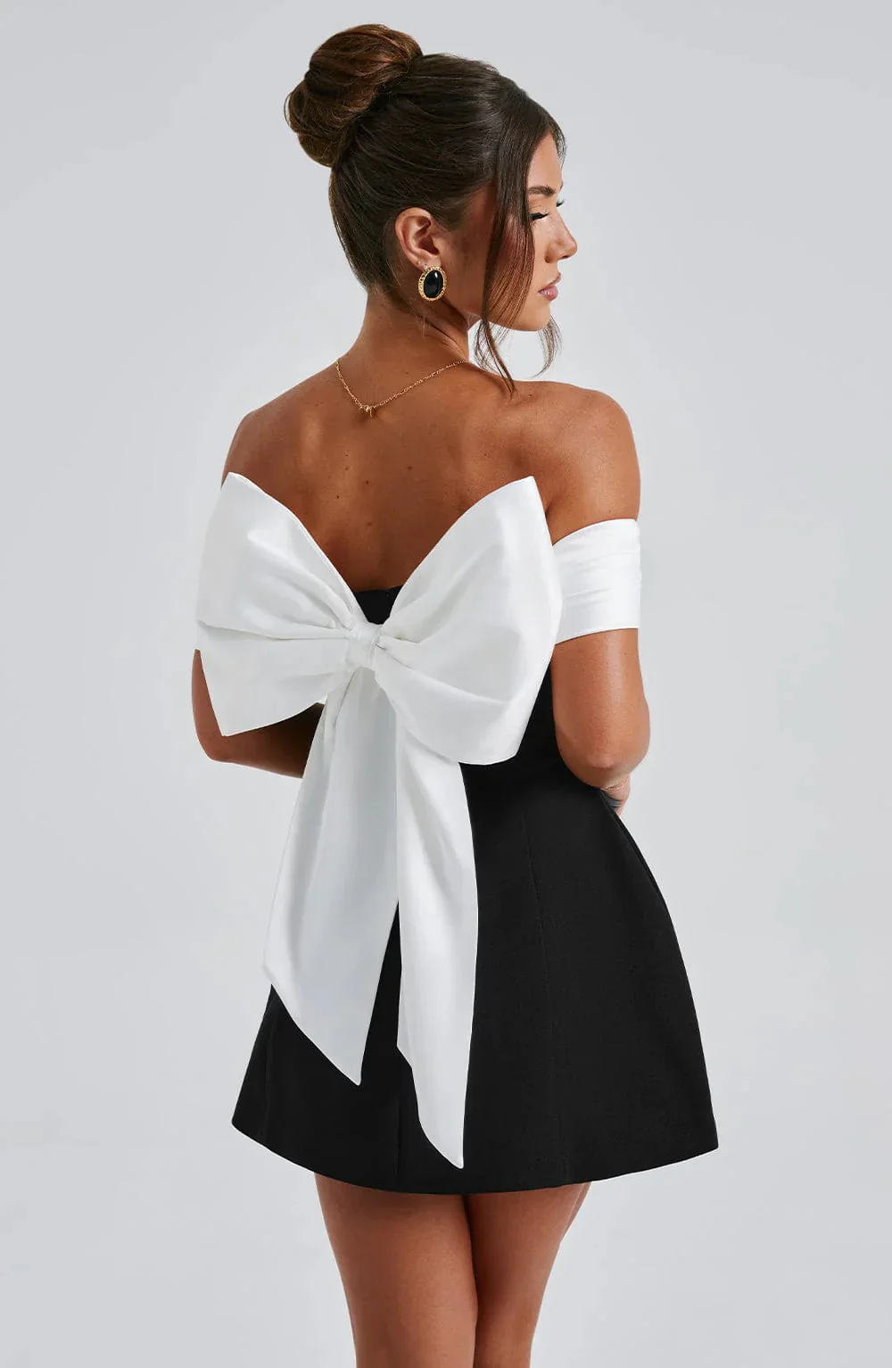 Sophisticated Mini Dress With A Bow Design - Image 8